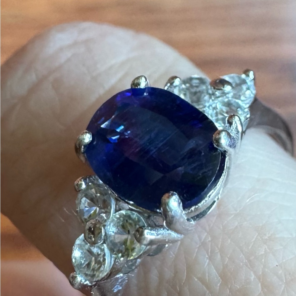 Blue Sapphire Halo Ring with Side Zircon Stones